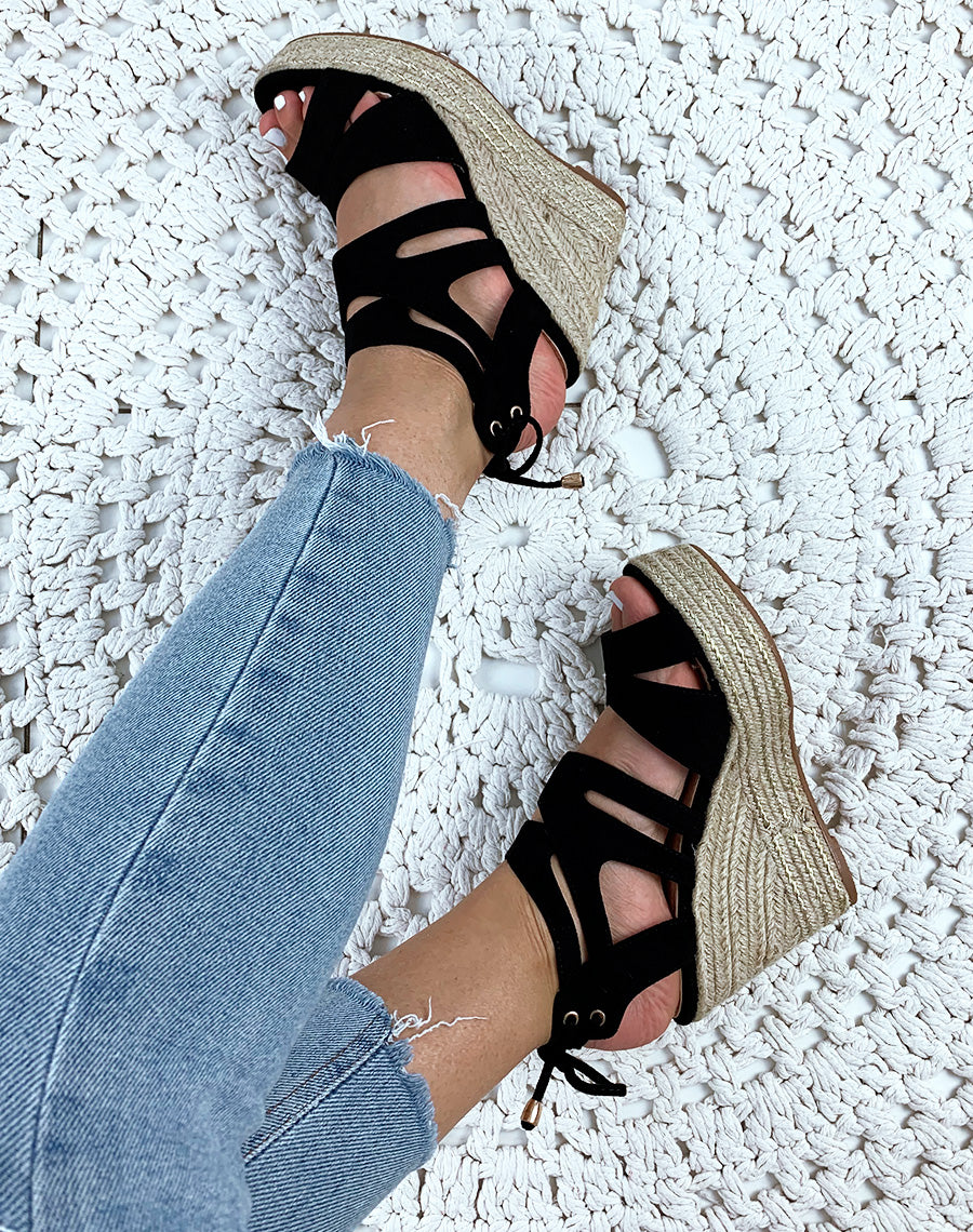 Compensées en suédine noirs à multiples brides