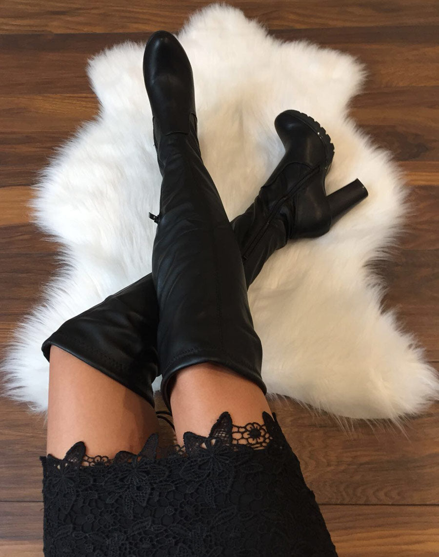 Cuissardes noires à talons hauts