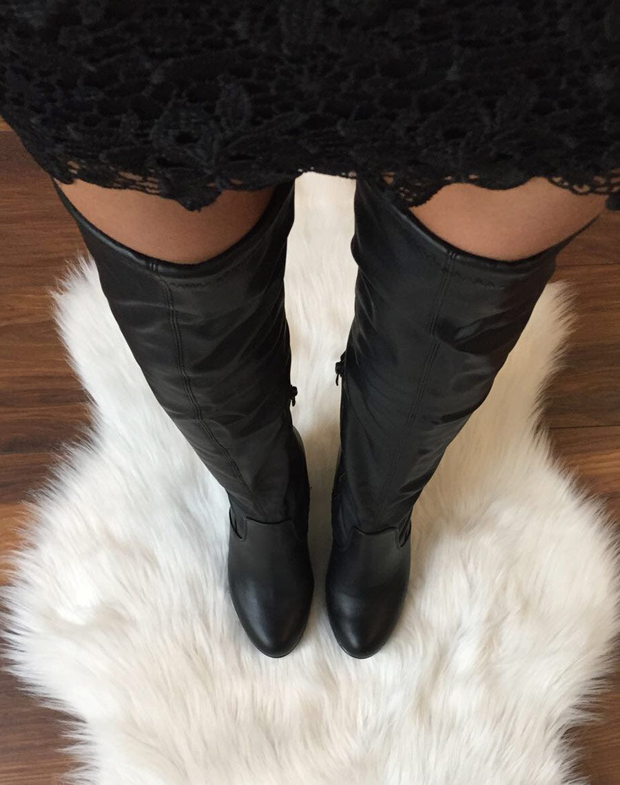 Cuissardes noires à talons hauts