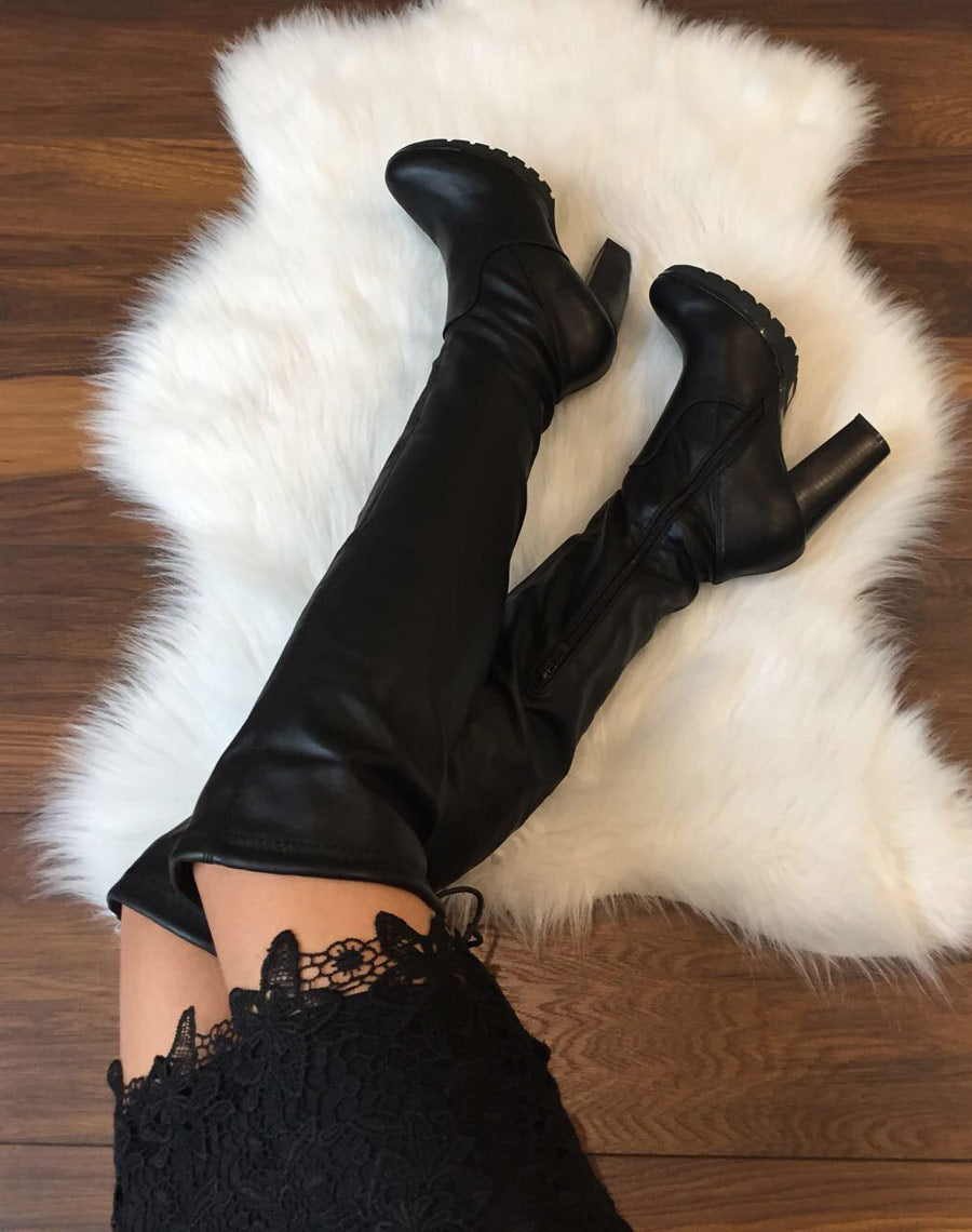 Cuissardes noires à talons hauts