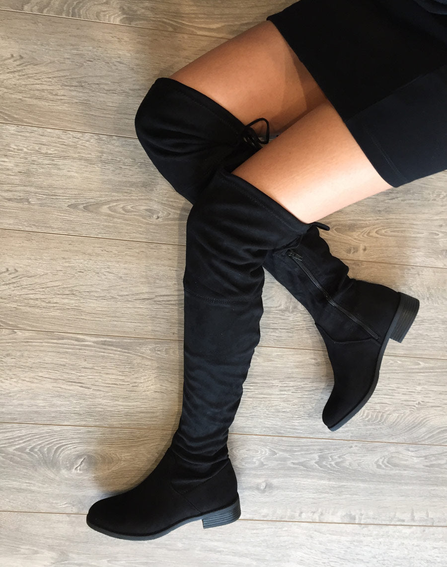Cuissardes plates noires en suédine