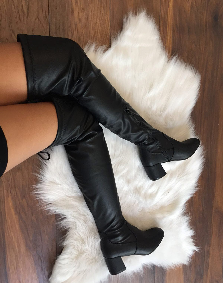 Cuissardes souples noires à talons mi hauts