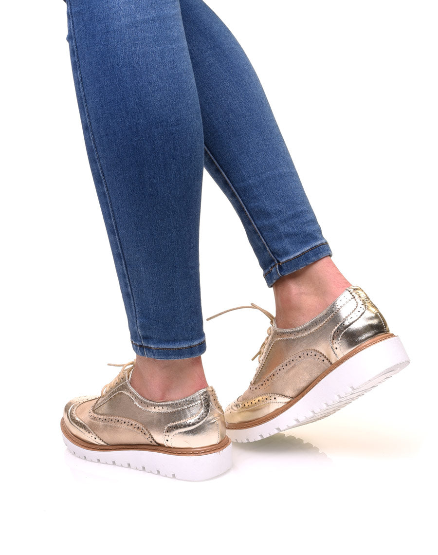 Derbies bi-matières or à semelles compensées