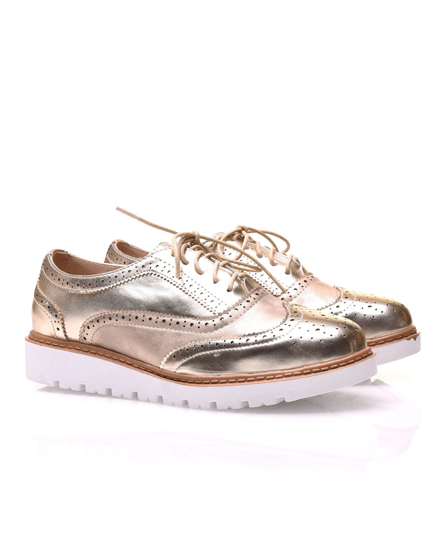 Derbies bi-matières or à semelles compensées