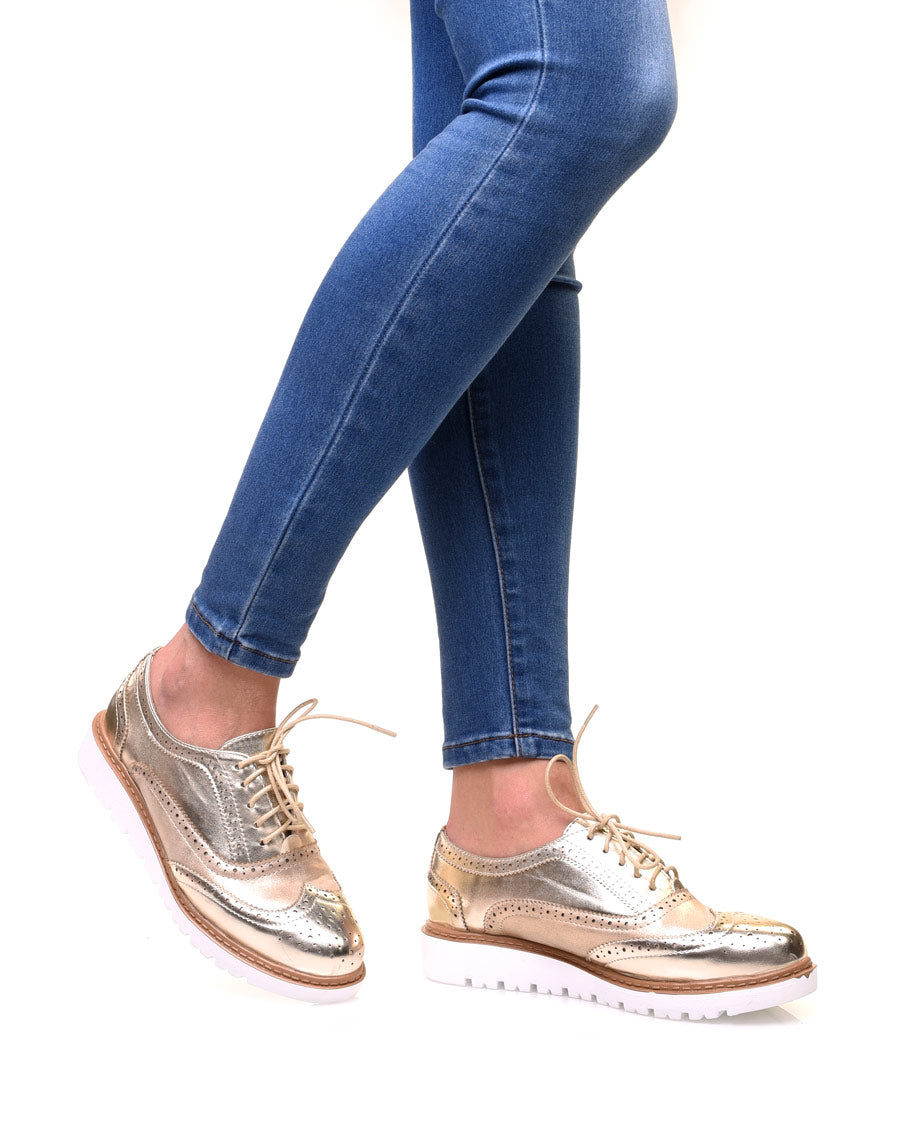 Derbies bi-matières or à semelles compensées