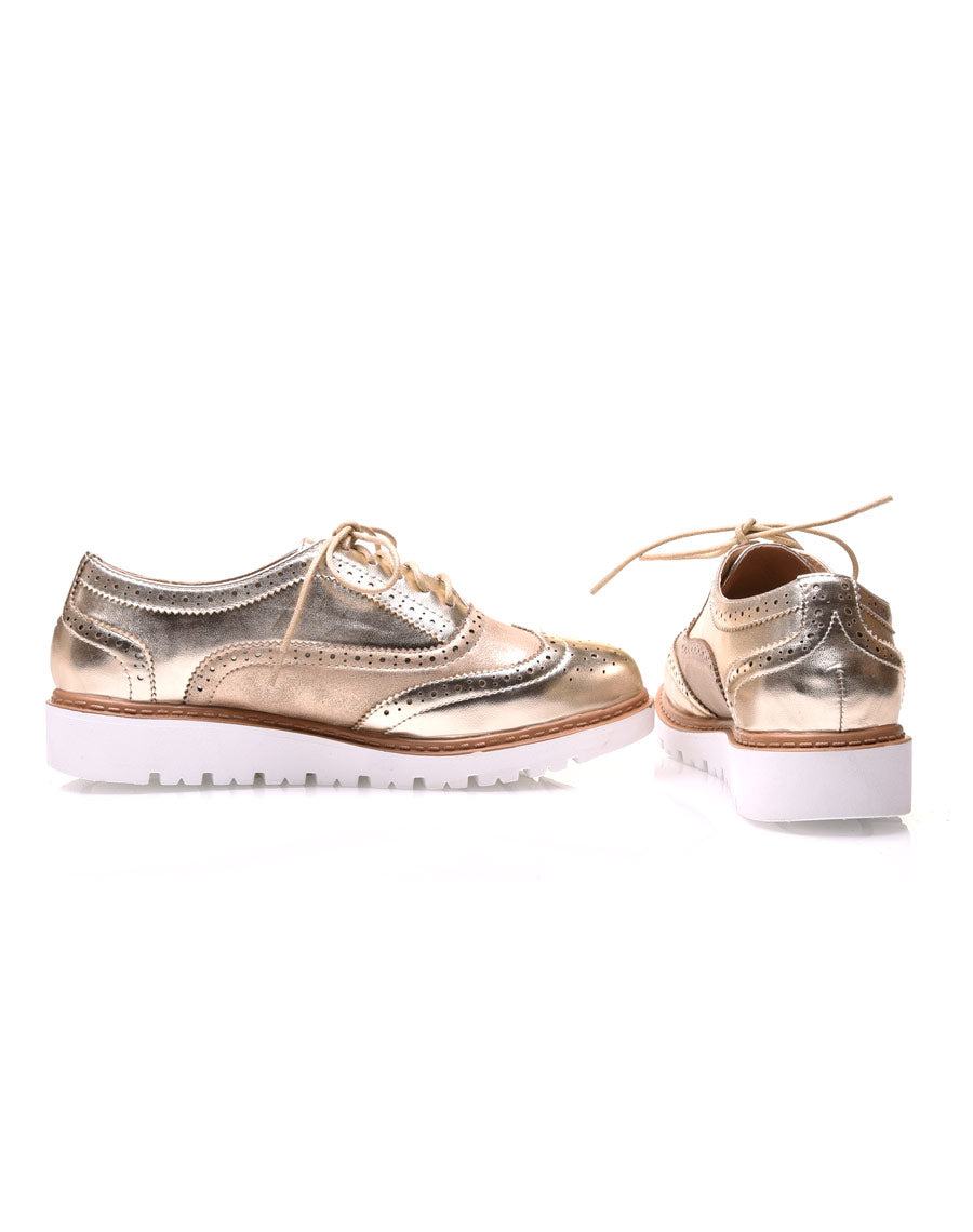 Derbies bi-matières or à semelles compensées