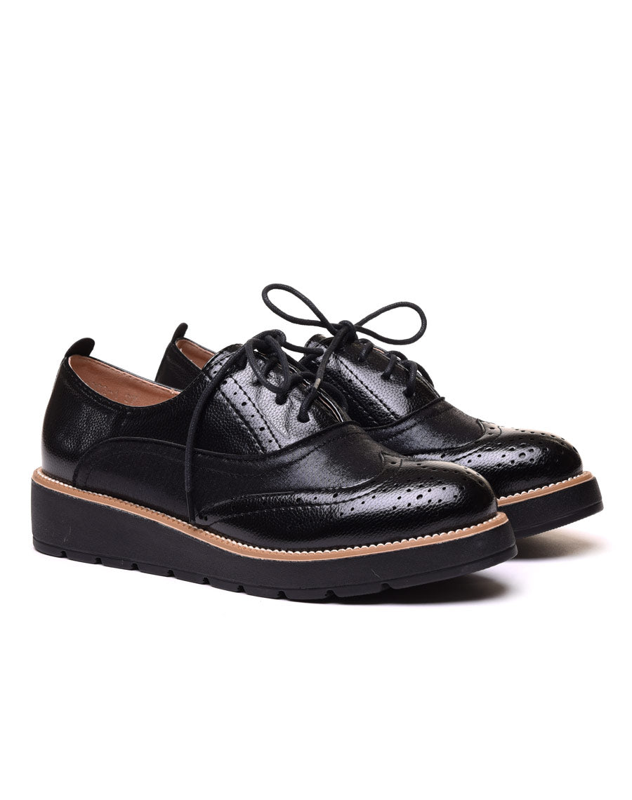 Derbies brillantes noires à semelle compensée
