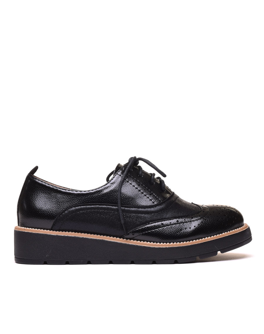 Derbies brillantes noires à semelle compensée