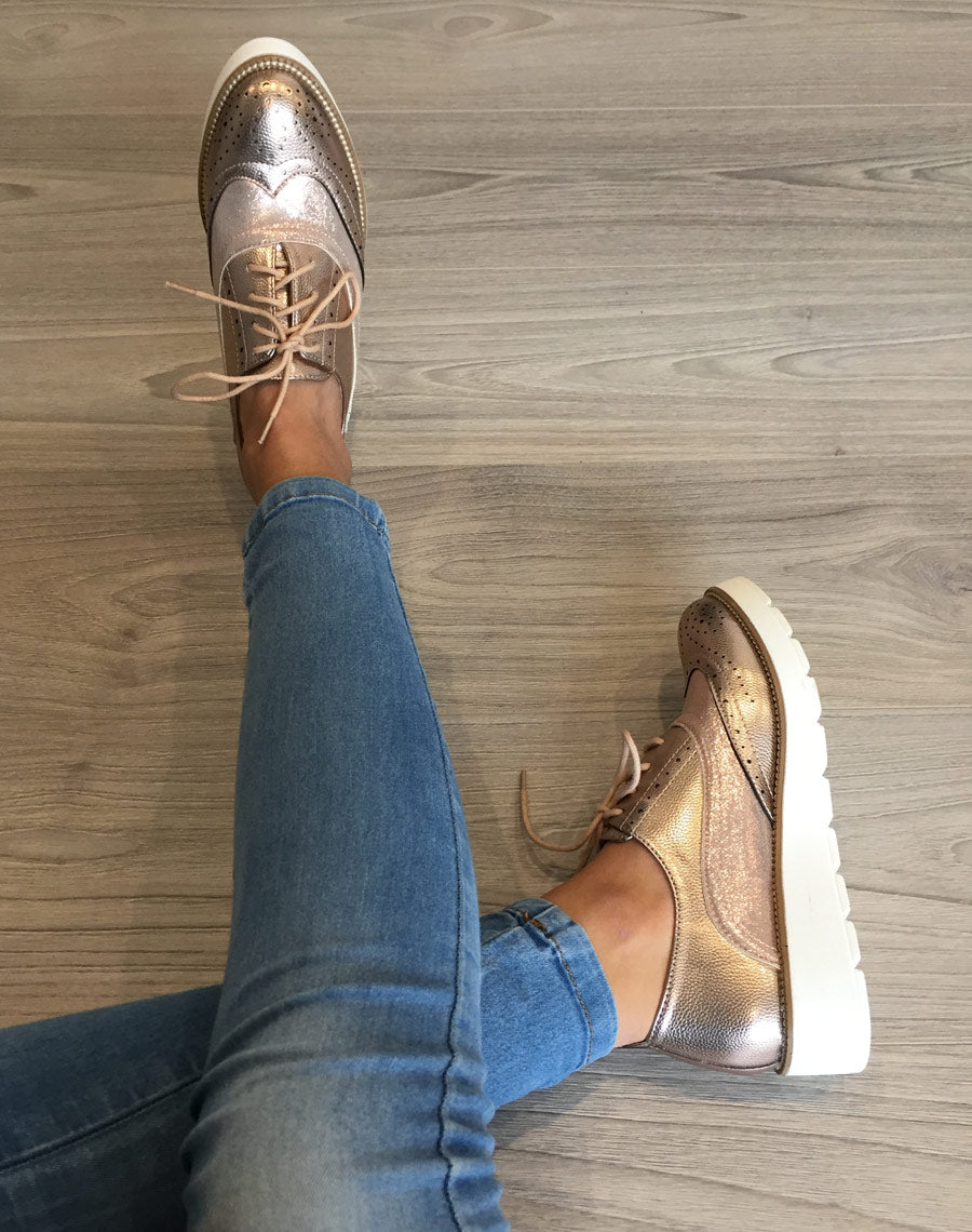 Derbies brillantes roses à semelle compensée