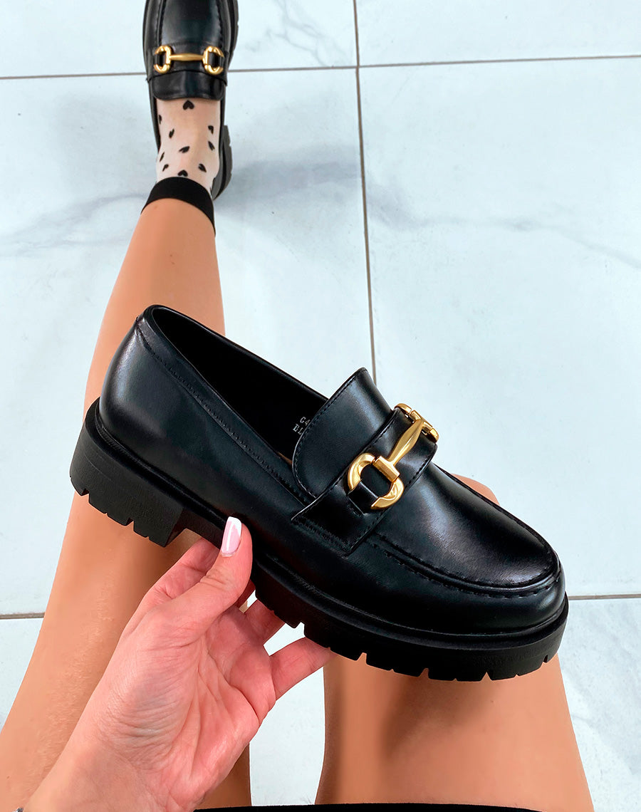 Mocassins noires à détail doré pour femme