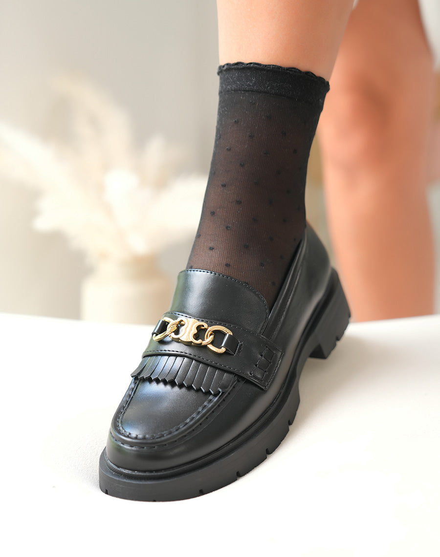 Mocassins noires tendance à détail dorée et semelle épaisse crantée