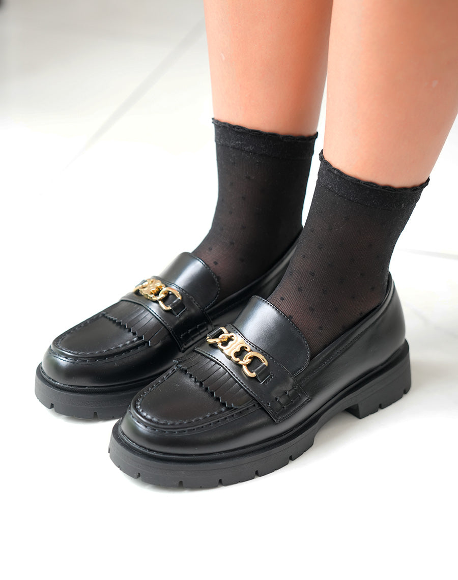 Mocassins noires tendance à détail dorée et semelle épaisse crantée