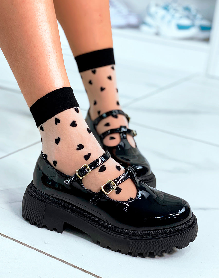 Mocassins noires vernis ouverts à plateforme avec lanières