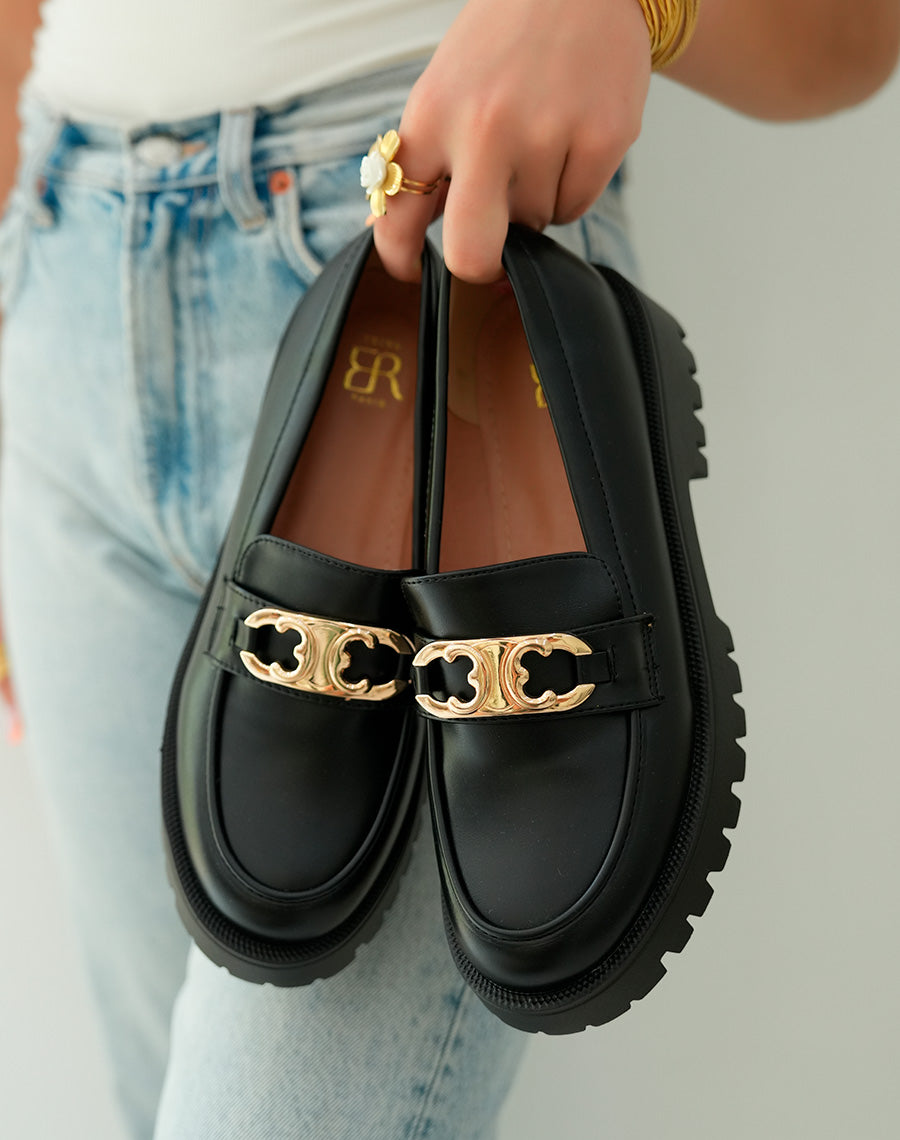 Mocassins noirs avec bijou doré et plateforme crantée