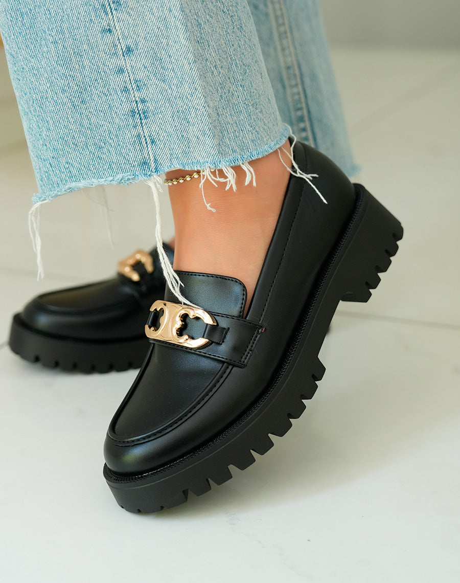 Mocassins noirs avec bijou doré et plateforme crantée