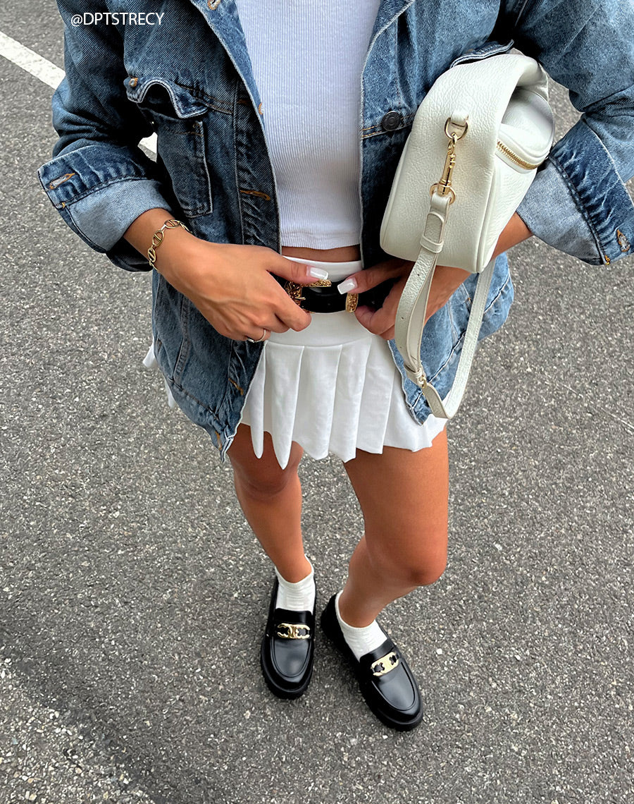 Mocassins noirs avec bijou doré et plateforme crantée