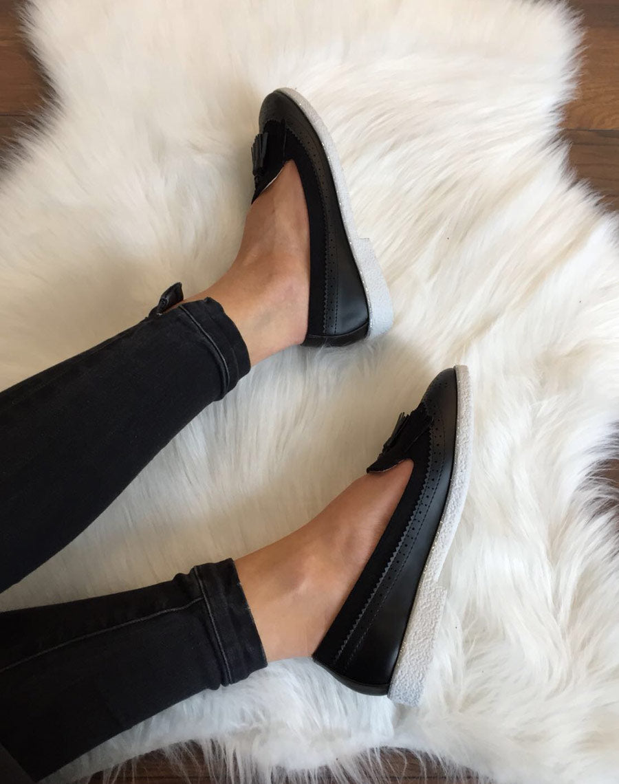 Mocassins noirs perforés