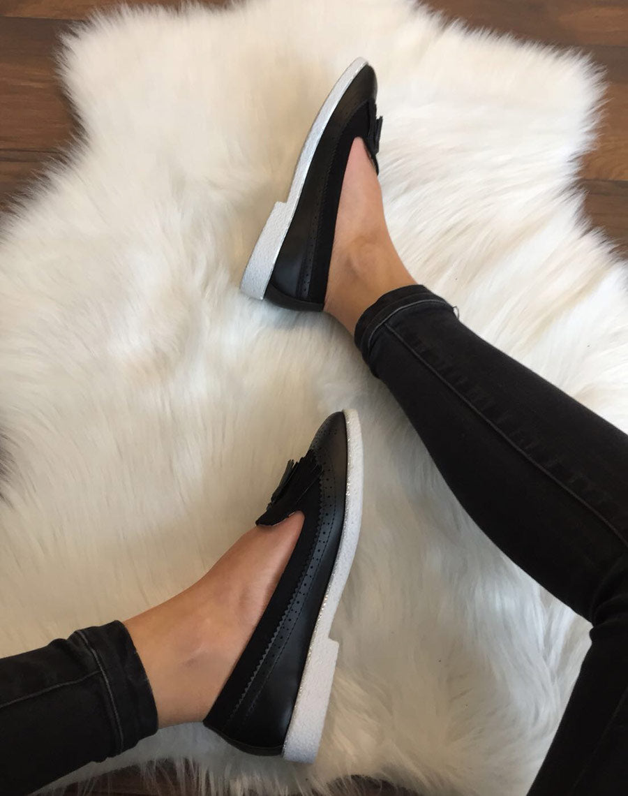 Mocassins noirs perforés