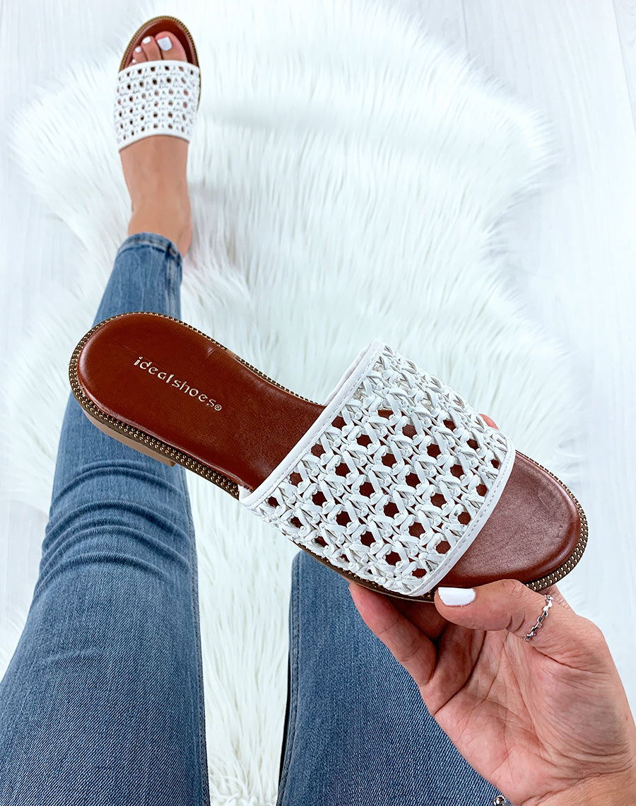 Mules blanches à brides tressées en similicuir