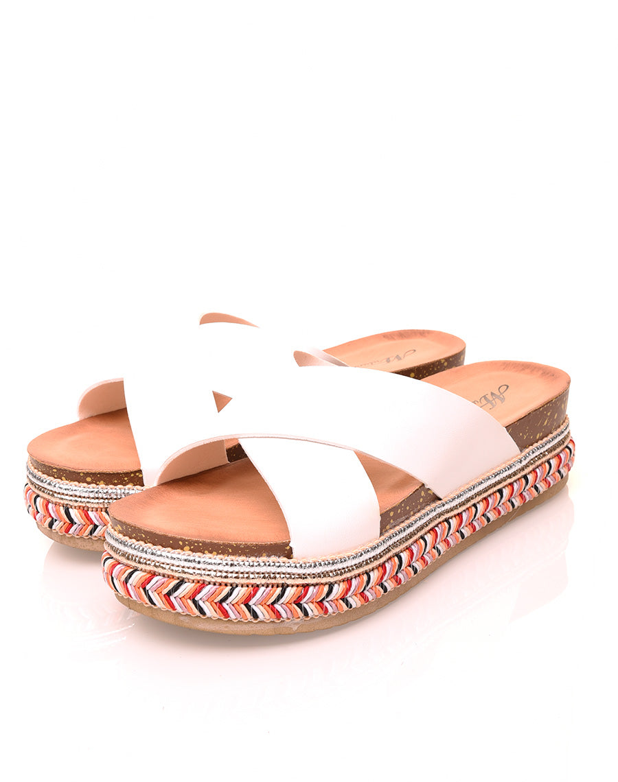 Mules blanches à doubles brides croisées et semelles tressées