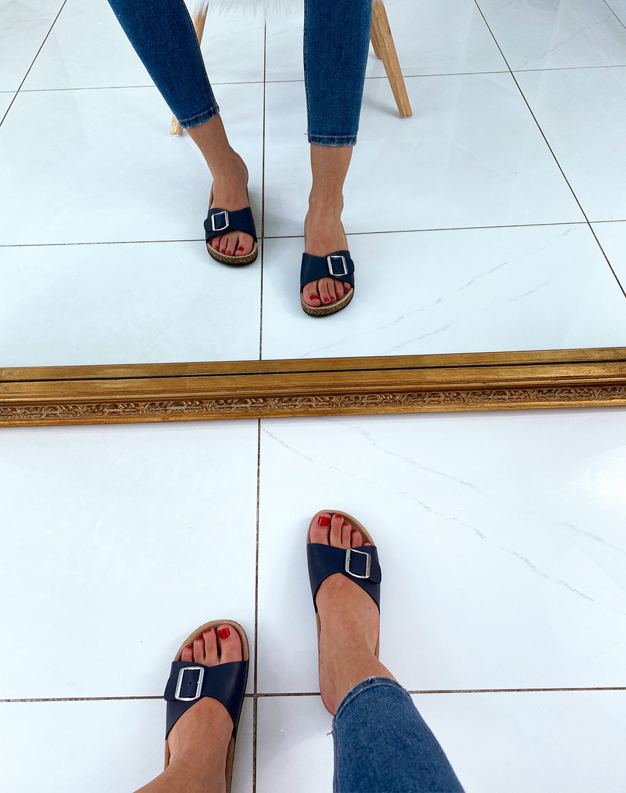 Mules bleus à boucles et à semelles anatomiques