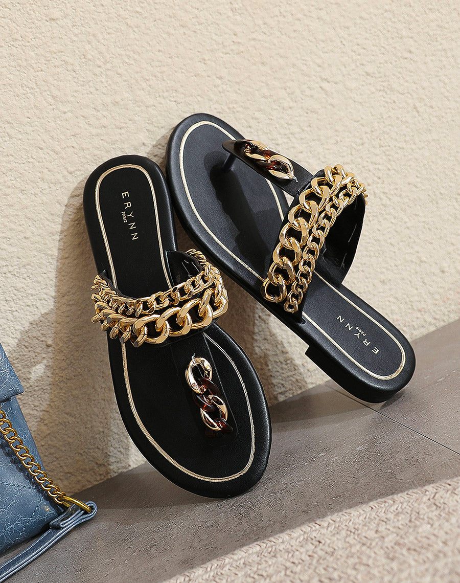 Mules à entredoigt noires avec chaines dorées