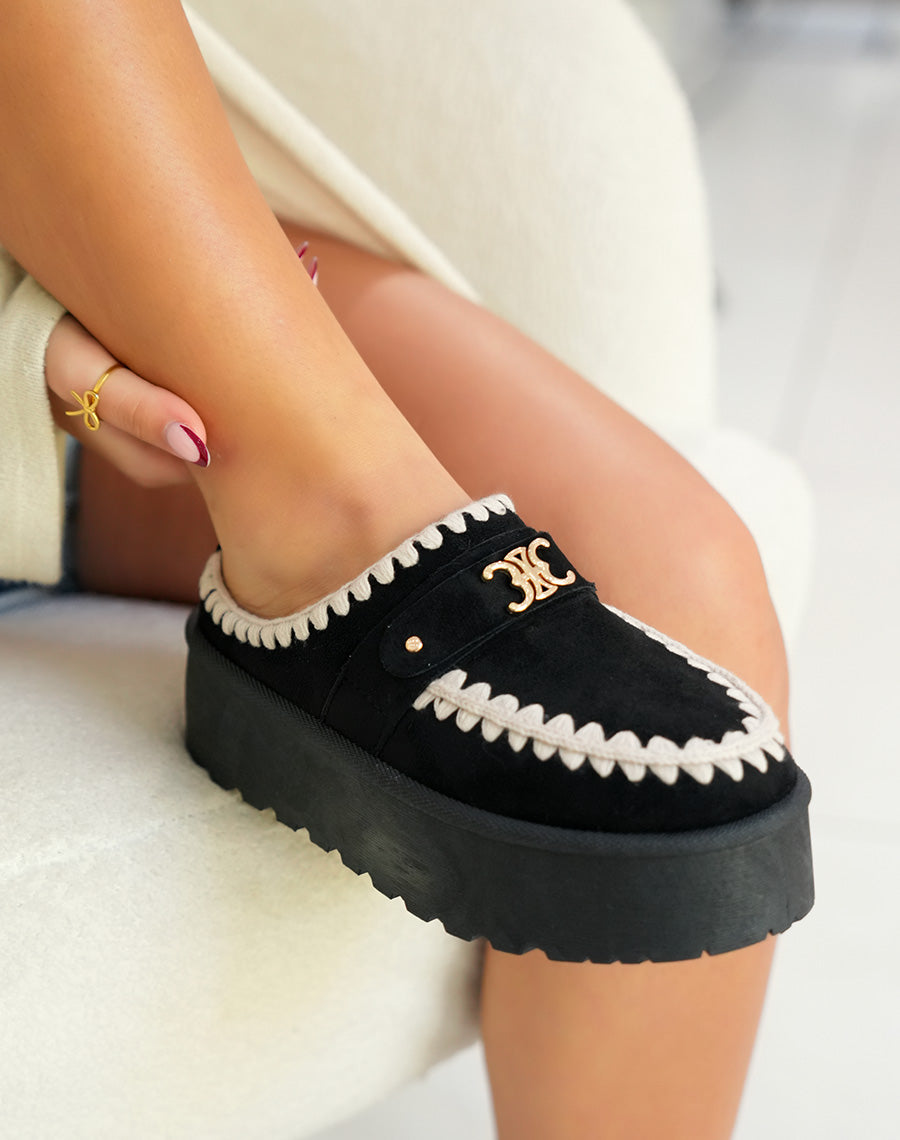 Mules femme noires tendance avec broderies beige et détail doré