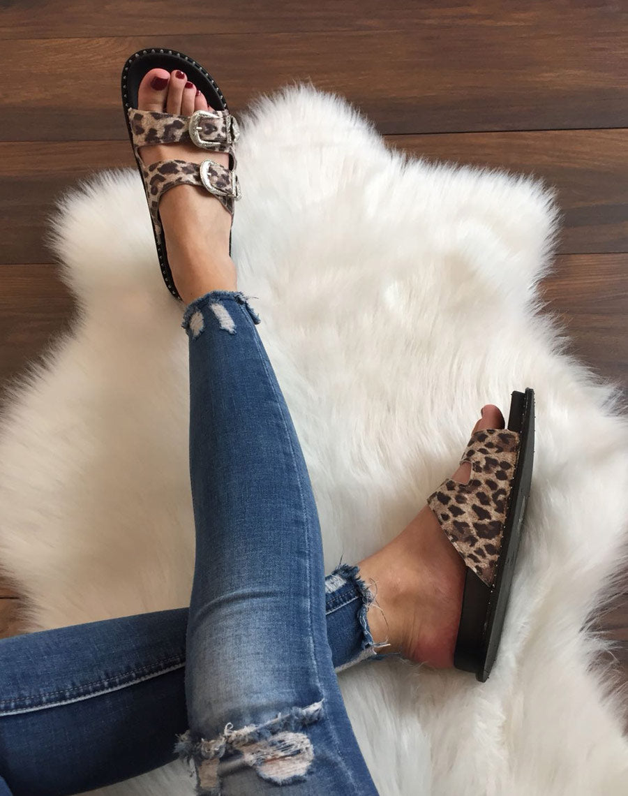 Mules imprimé léopard à boucles argent