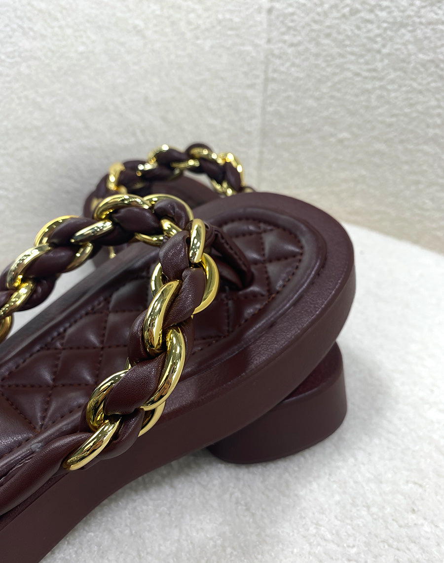 Mules marron chocolat à semelle épaisse et lanière torsadée noire et dorée