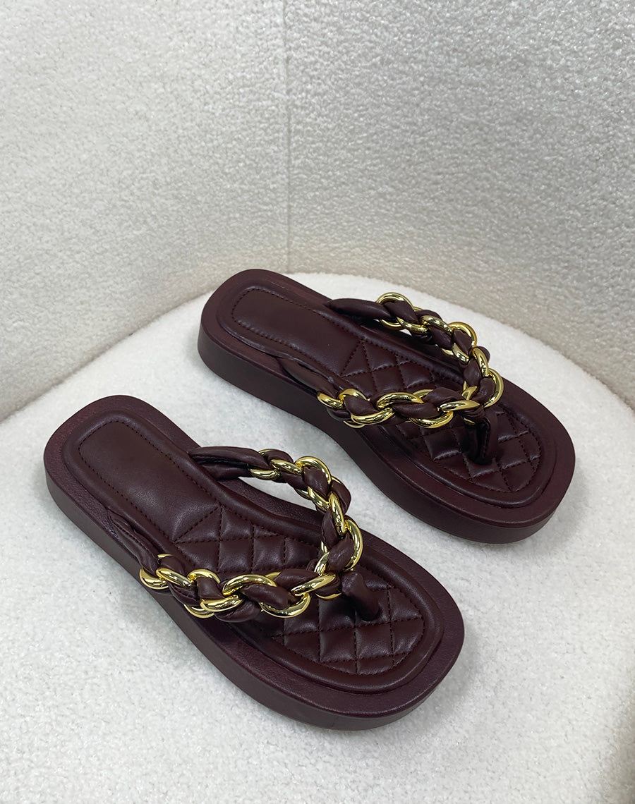 Mules marron chocolat à semelle épaisse et lanière torsadée noire et dorée