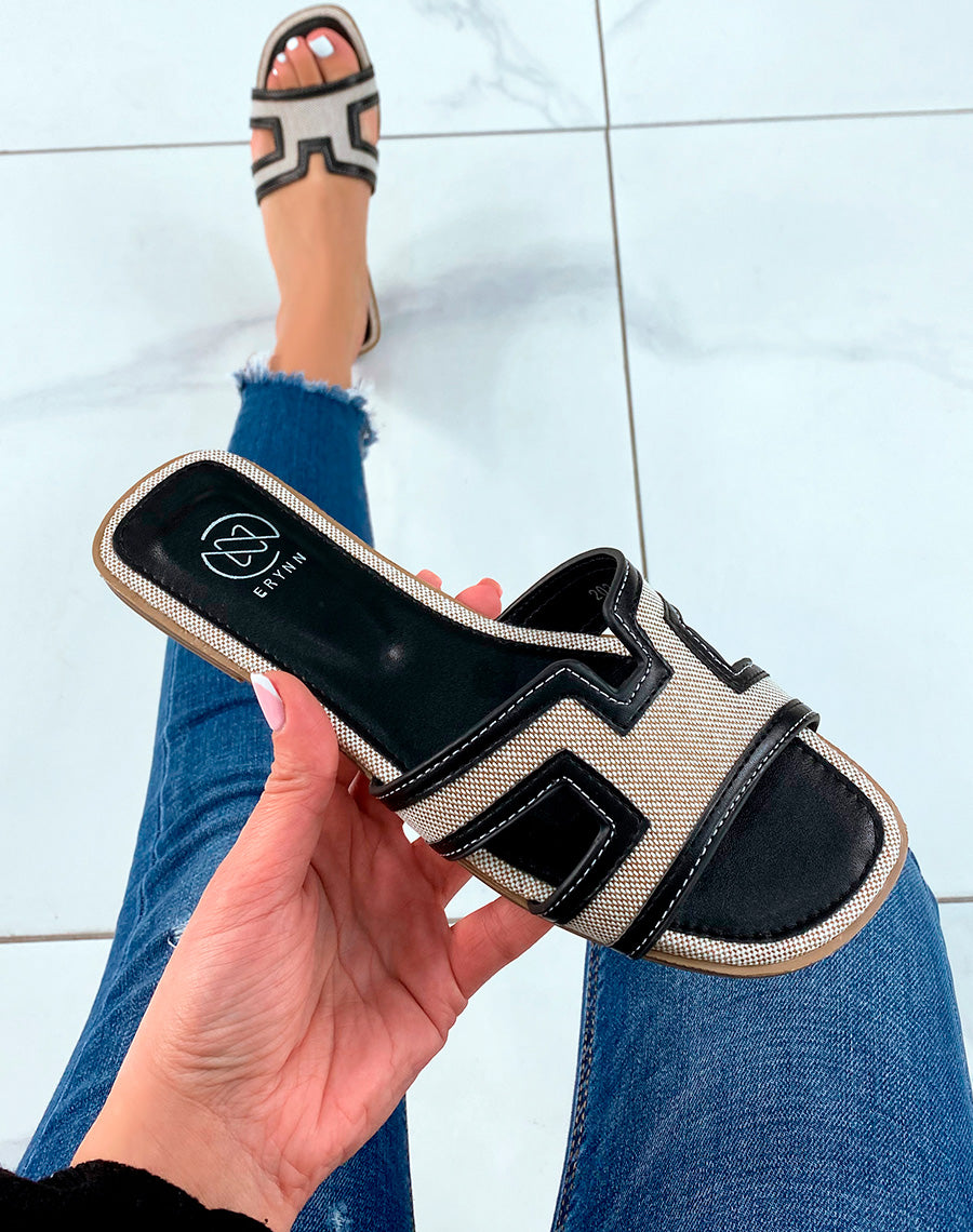 MULES NOIRES BI-MATIÈRE ET FORME EN H