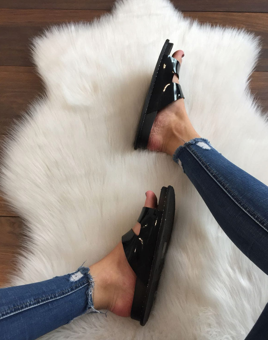 Mules noires à boucles argent