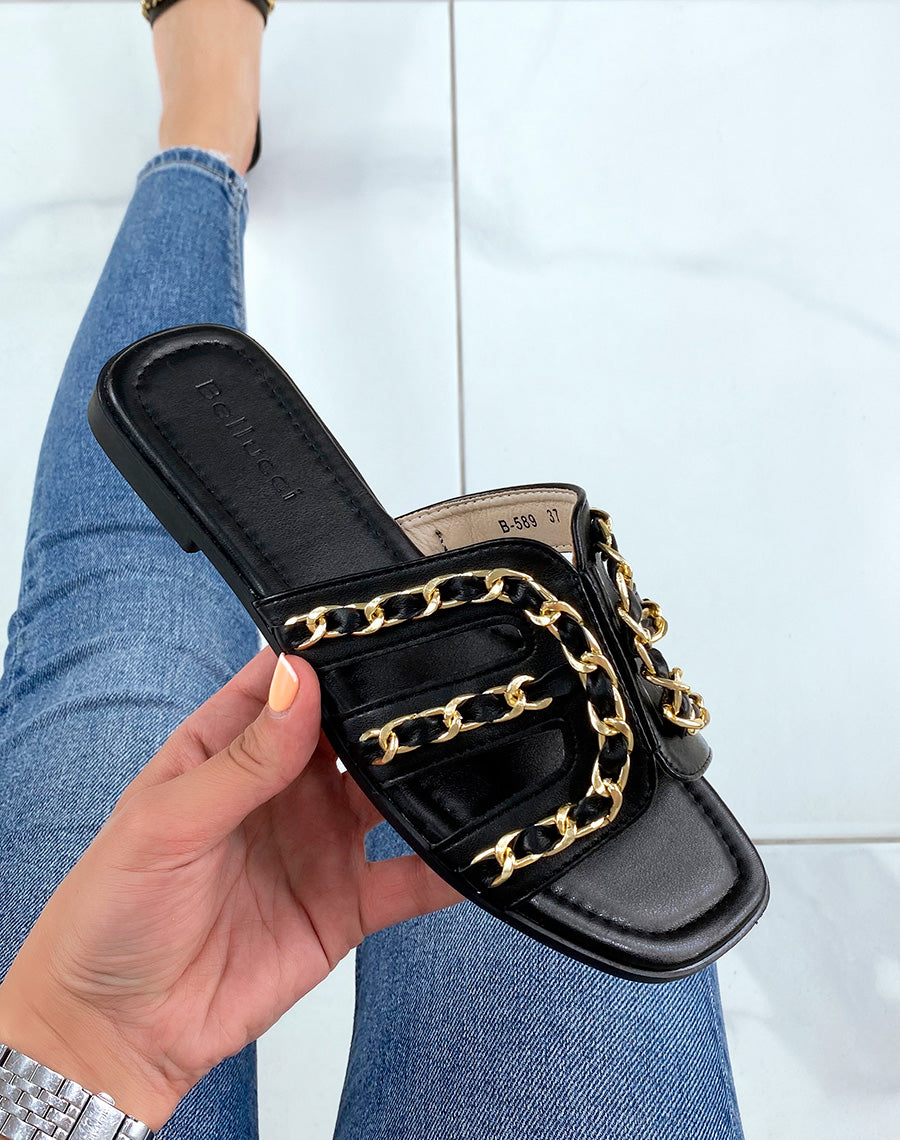Mules noires à brides ouvertes croisées à chaîne dorée