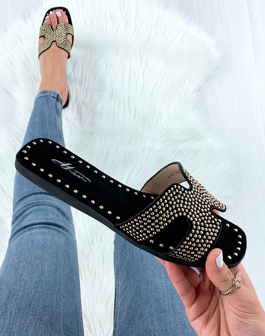 Mules noires cloutées