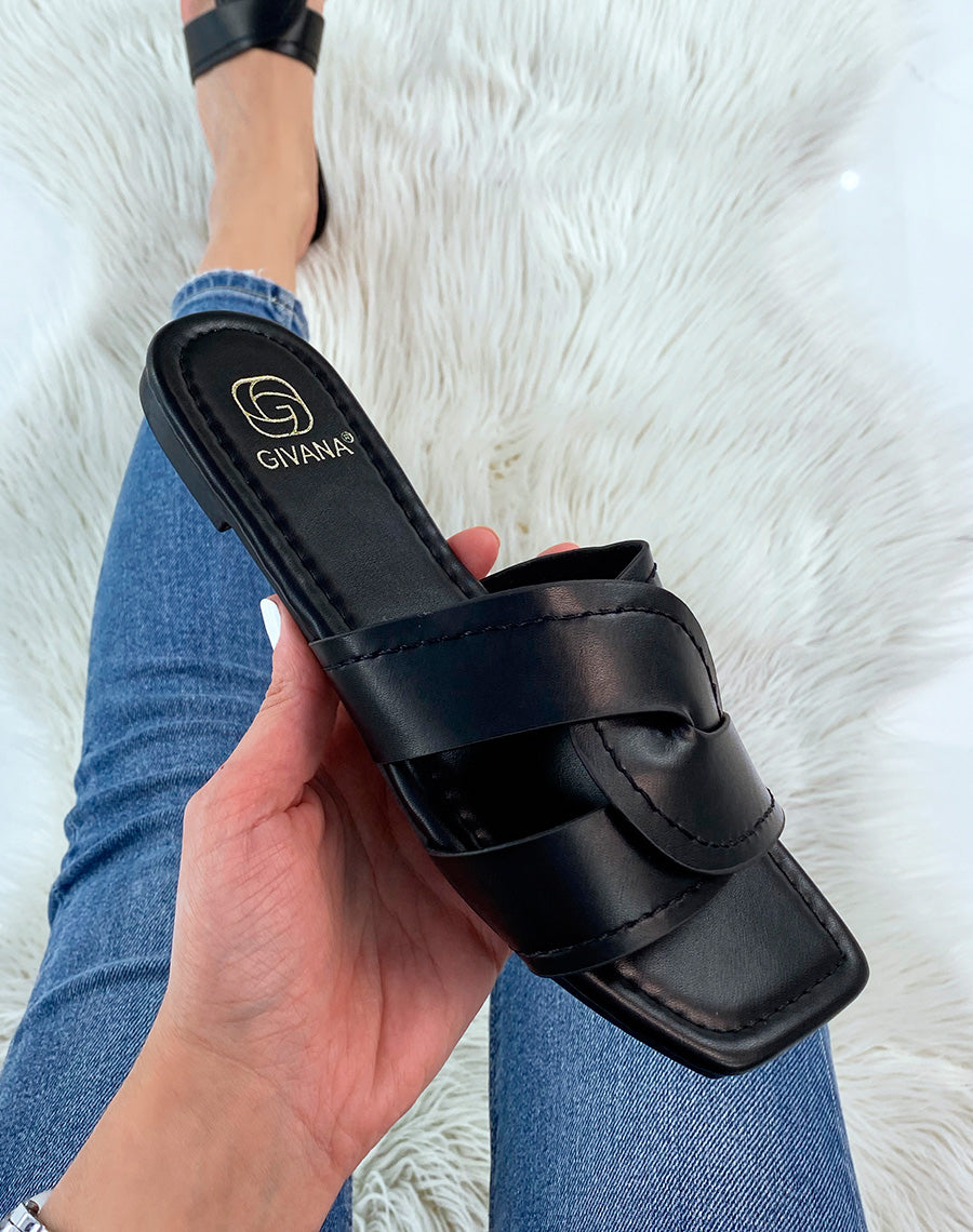 Mules noires à larges brides entrecroisées