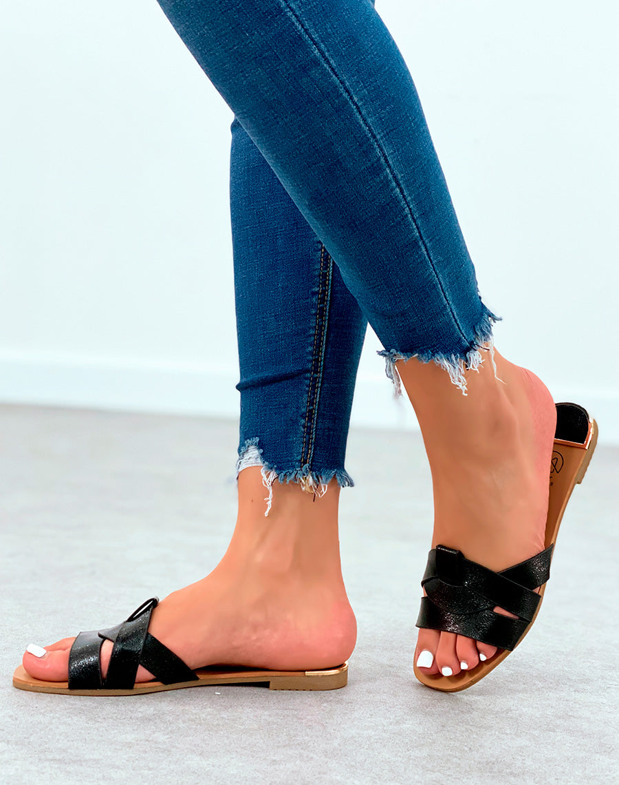 Mules noires plates à bride entrecroisées et à détail dorée et noir