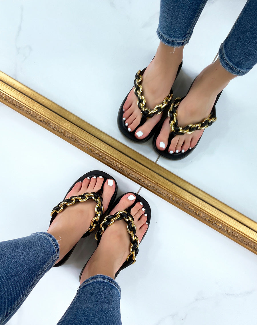 Mules noires à semelle épaisse et lanière torsadée noire et dorée