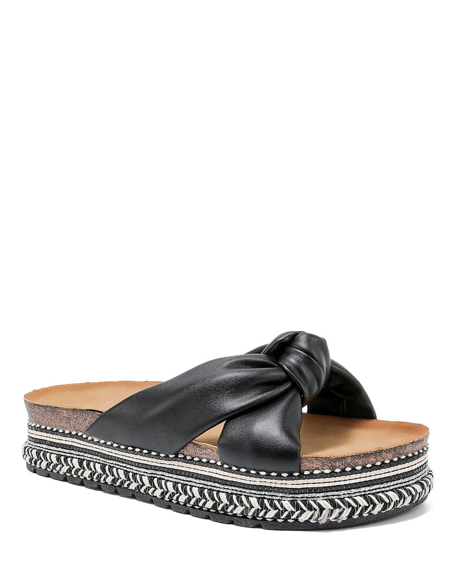 Mules nouées noires avec motifs aztèques