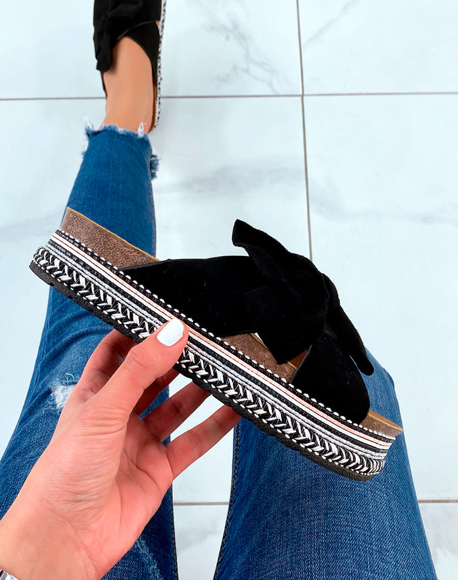 Mules à plateforme en suédine noire à gros noeud