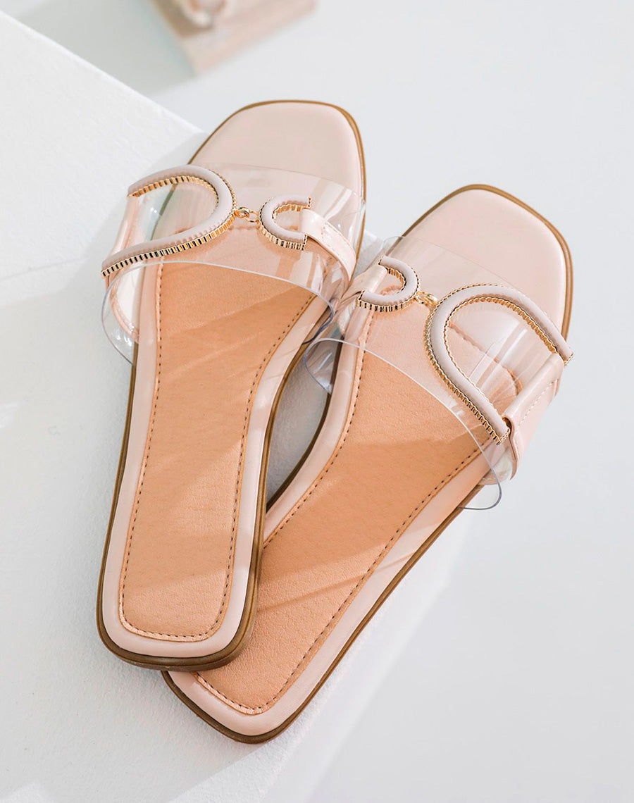 Mules plates beiges à bride transparente et bijoux doré