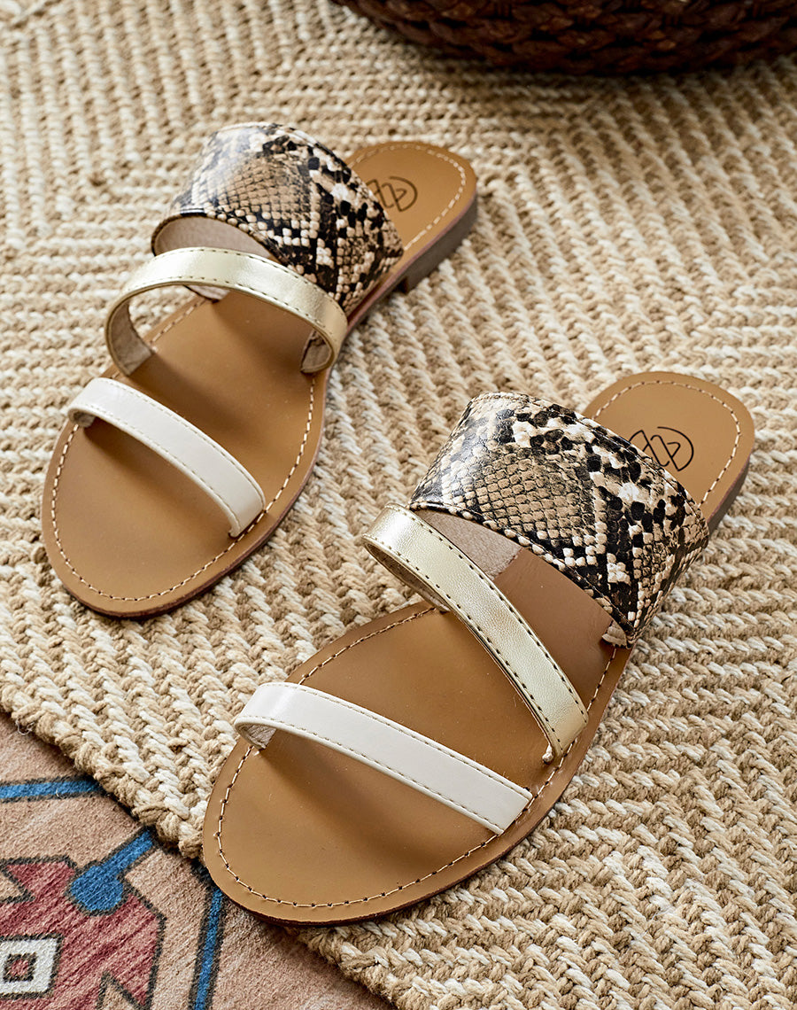 Mules plates beiges à triple brides