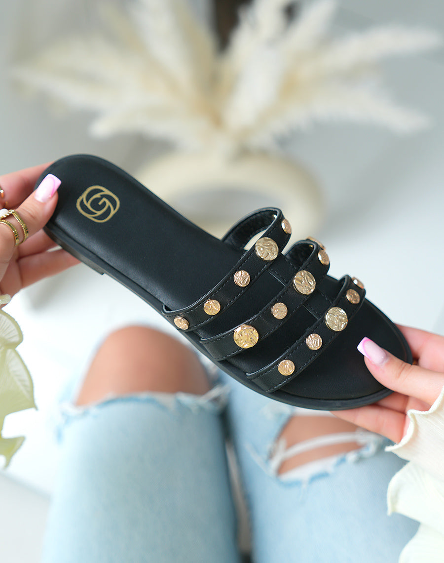 Mules plates femme noires élégantes à triples brides avec bijoux dorés