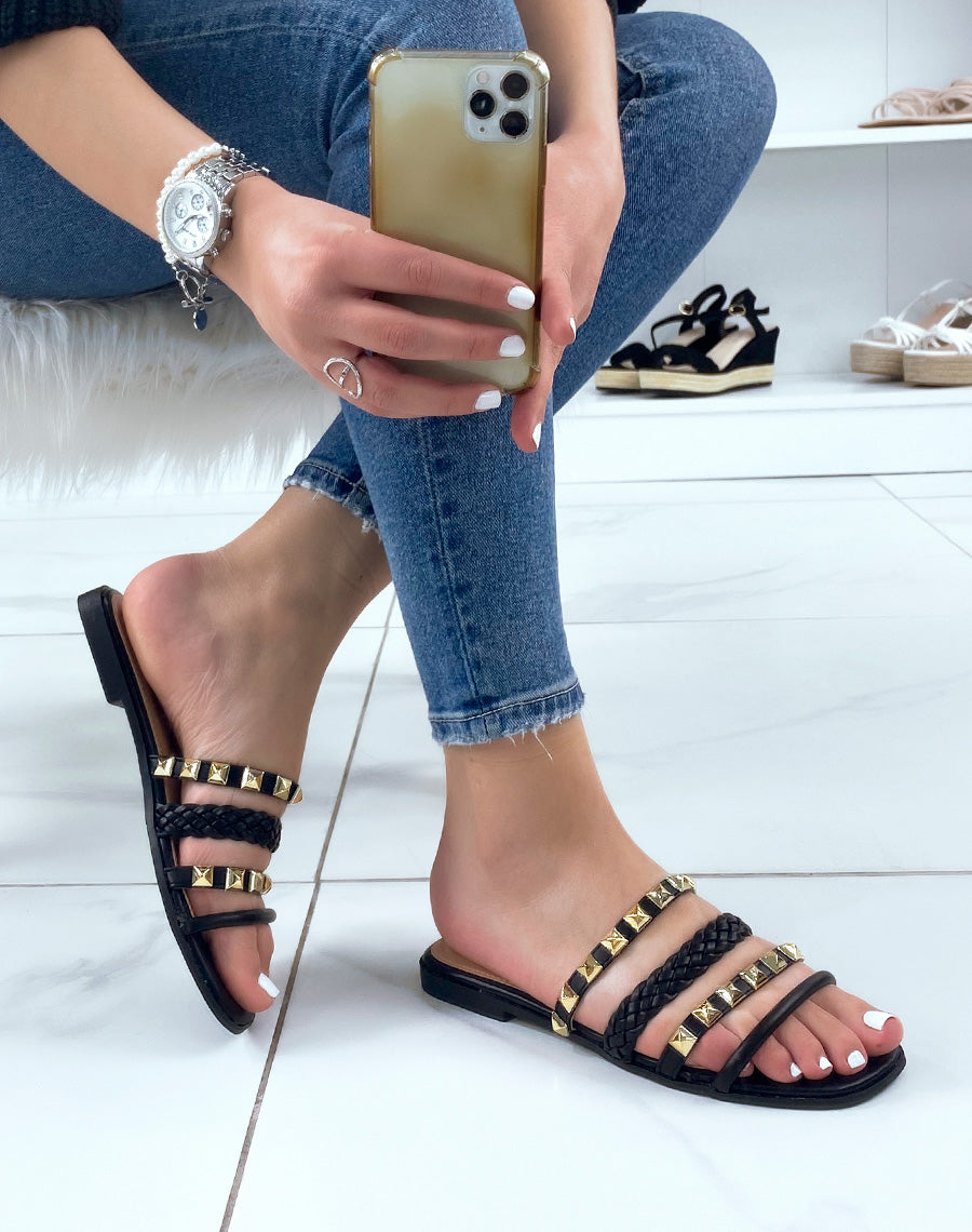 Mules plates à multiples lanières tressées et à détails dorés