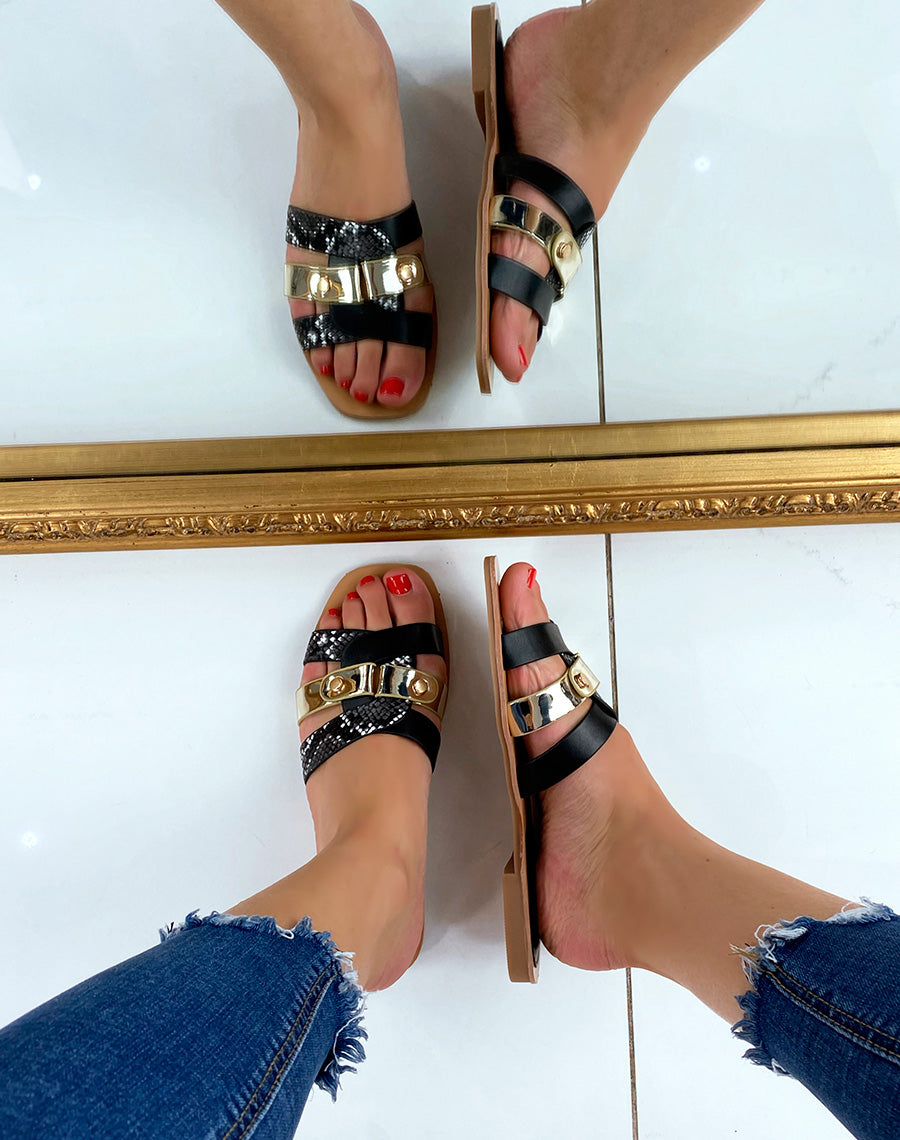 Mules plates noires à brides entremêlées et détails python et dorés