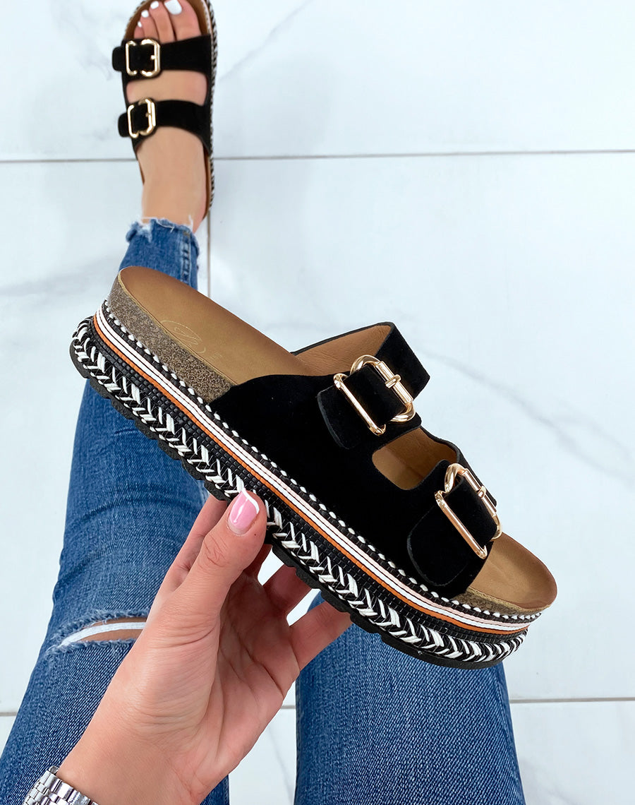 Mules plates noires à double bride et semelle aztèque