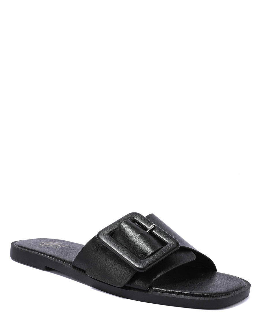 Mules plates noires à grosse lanière ceinturée