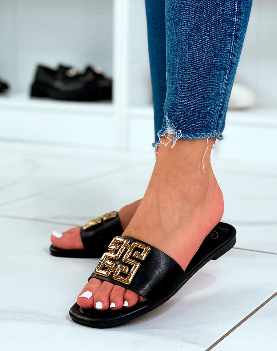 Mules plates noires à motif doré