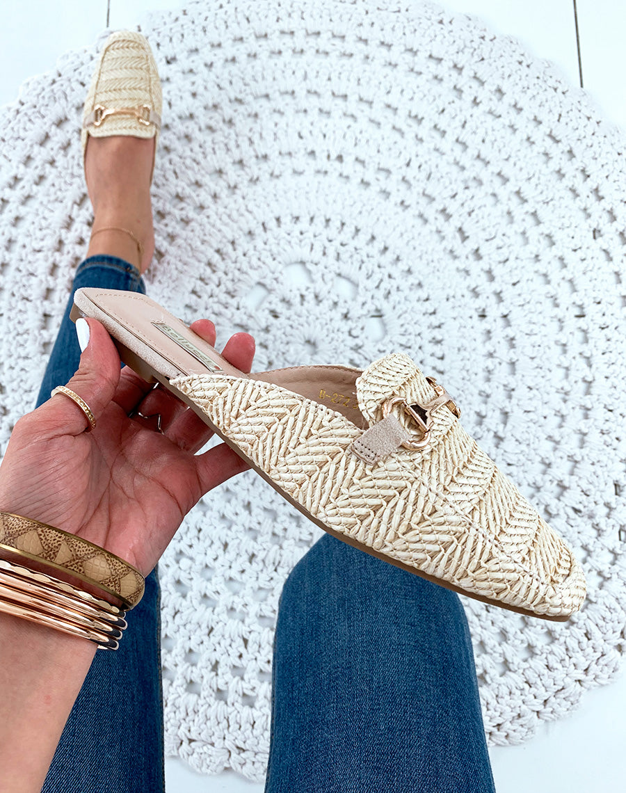 Mules style mocassins en osier beiges