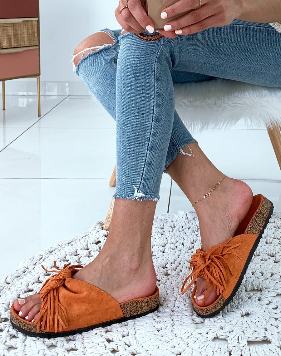 Mules une suédine oranges à larges brides en nœud et à franges