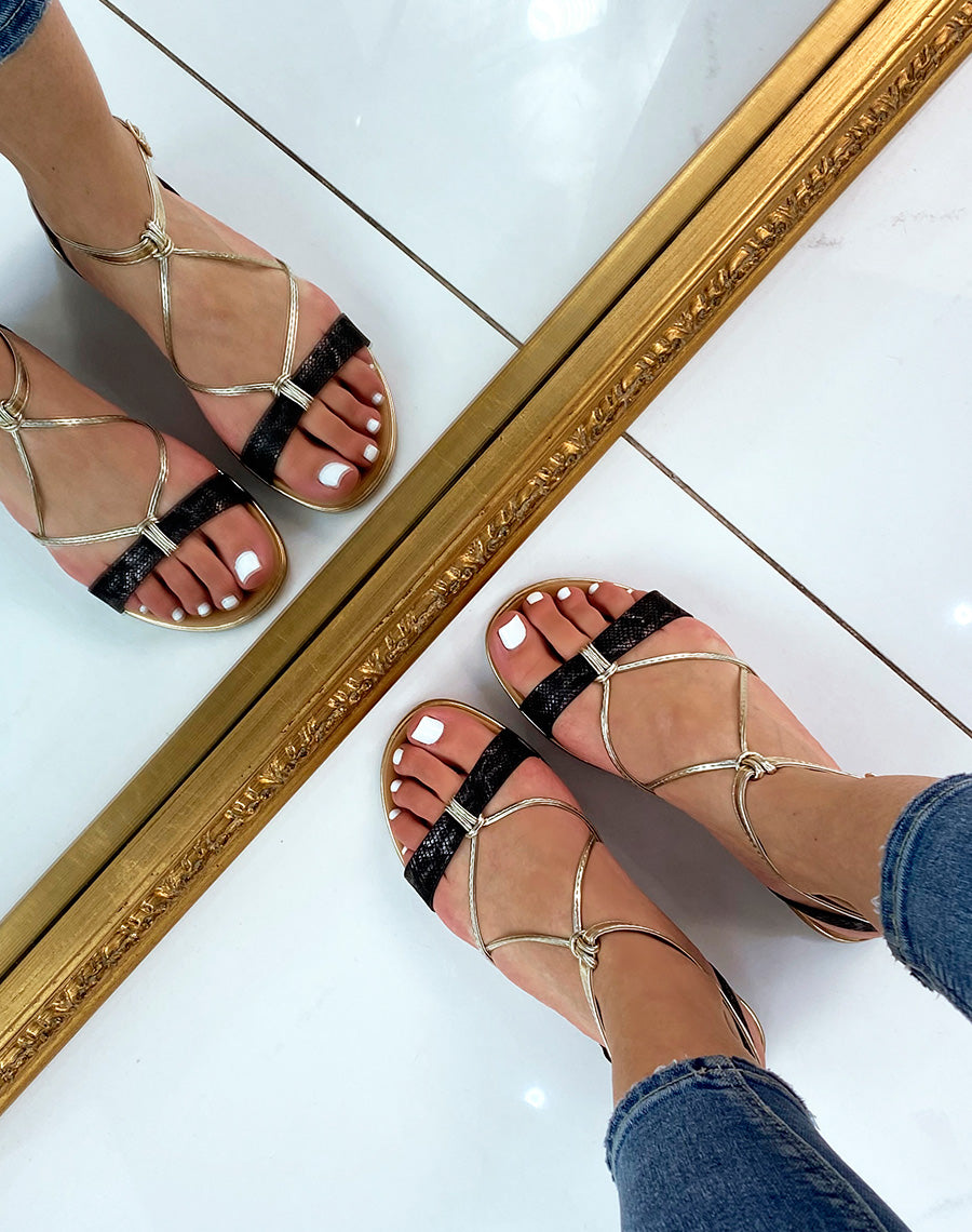 Nu-pieds à brides noires et dorées